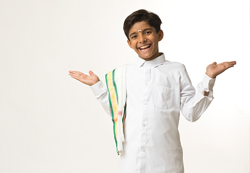 Happy south indian boy in traditional clothing