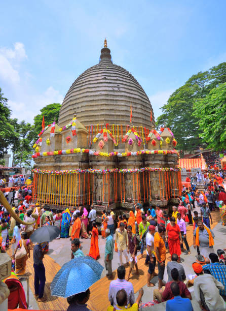 Huge crowd of devotees visiting Kamakhya temple during Ambubachi mela. Guwahati, India - June 23, 2018: Huge crowd of devotees visiting Kamakhya temple during Ambubachi mela. guwahati stock pictures, royalty-free photos & images