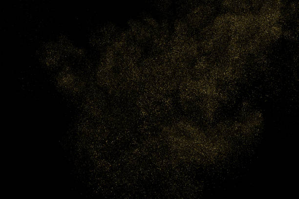 Golden stardust vector Gold Glitter Texture Isolated on Black Background. Golden stardust. Amber Particles Color. Sparkles Rain. Vector Illustration, Eps 10. gold layer stock illustrations