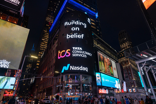 New York, NY, USA - July 5, 2022: Front view of the Nasdaq Tower in Times Square, Midtown Manhattan, New York City. TATA Consulting Services (TCS) advertising is seen on the giant digital screen outside the Nasdaq MarketSite.