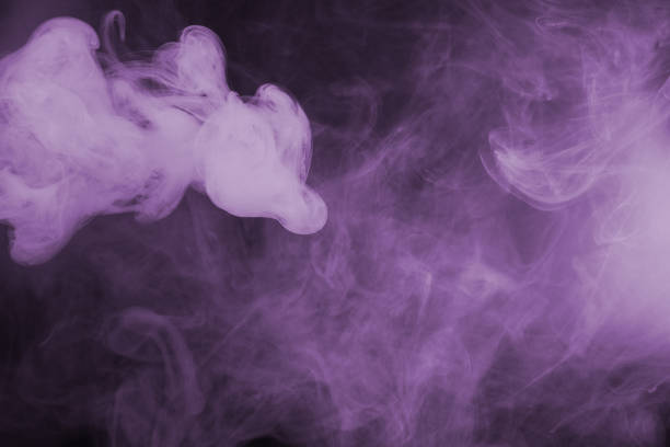 istock White steam on a black background. 1453041820