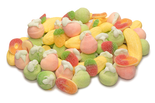 Mix of jelly colorful candys and marshmallows as a background.
