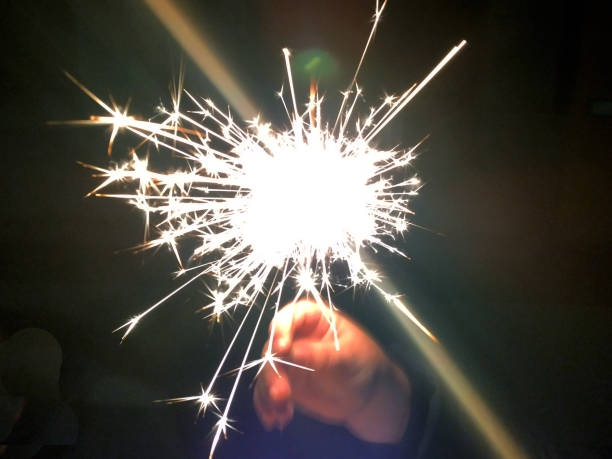 istock Hand-lit fireworks for New Year's Eve 1453044418
