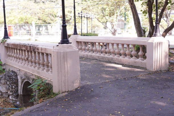 istock The picture shows a white bridge architectural structure designed to be placed on a large sewer system on the road floor. 1453044906