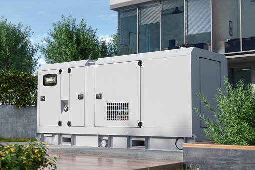 Close-up View Of Stationary Diesel Electric Generator In The Backyard
