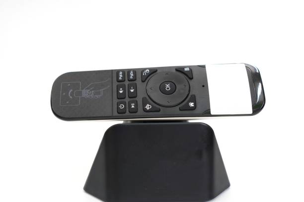 istock Image showing air mouse wireless remote for controlling media player device on a white background. 1453052908