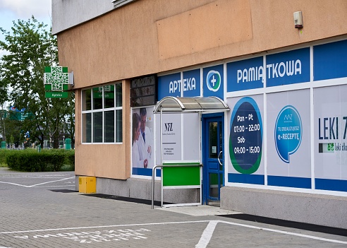 Poznan, Poland – May 22, 2022: An entrance of a small pharmacy store in the Pilsudskiego street in Poznan, Poland
