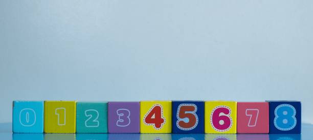 istock Panoramic view of cubes with numbers on the blue background 1453055933
