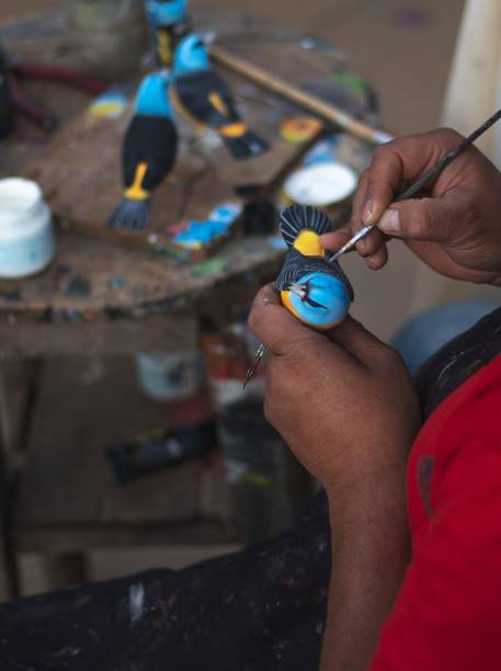 istock Bird of wood being painted 1453059903