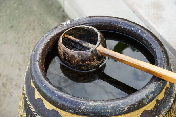 istock Coconut shell product in Glazed water jar. 1453067940