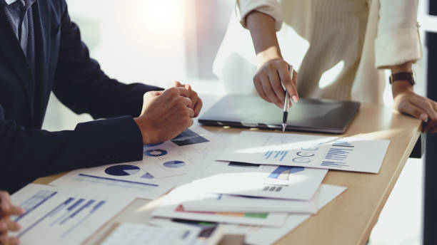 istock Business people meeting working with new startup project idea presentation analyze plan marketing and investment. 1453069584