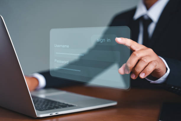 istock Business people use computers to log in to internet and corporate networks, Technology in work, Electronic security of companies and organizations. Technology makes work more comfortable and faster 1453070206
