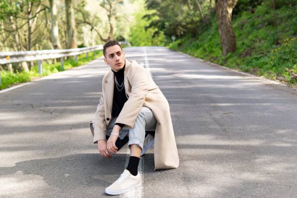 istock Young Hispanic Arab man posing on the road, gazing into infinity 1453071415