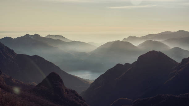 istock mountains with lake at twilight, aerial view 1453081384