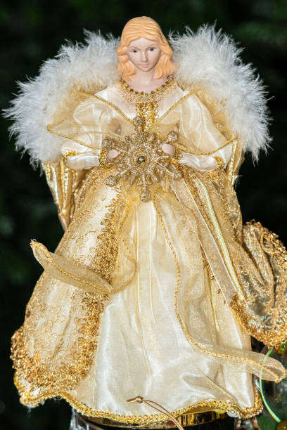 istock golden angel Christmas tree decoration 1453090900