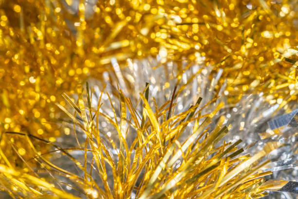 istock gold and silver Christmas tree tinsel decoration 1453092191
