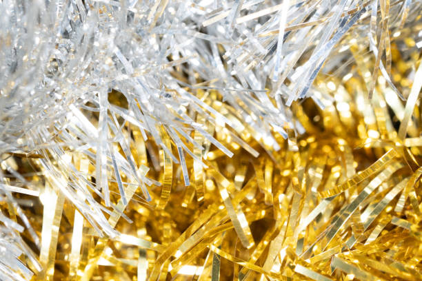 istock gold and silver Christmas tree tinsel decoration 1453092253
