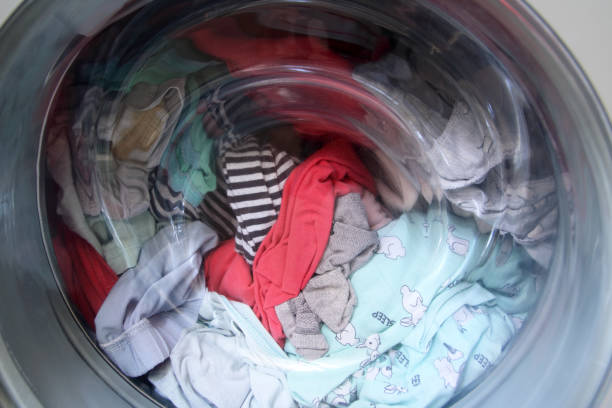 A fully loaded washing machine stock photo