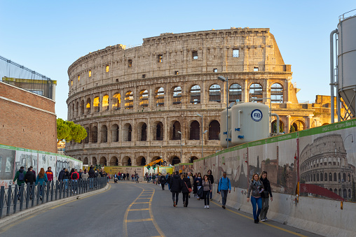Rome, Italy, December 28, 2022: The Colosseum and the Imperial Forums with the construction site for Rome's metro C, inconvenience for tourists