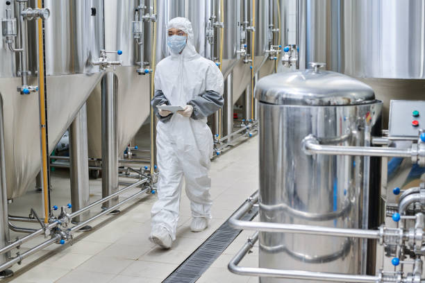 istock Worker working at chemical factory 1453095347