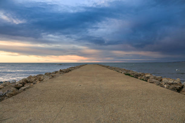 Colorful sunrise on the beach in Autumn in Santa Pola, Alicante, Spain