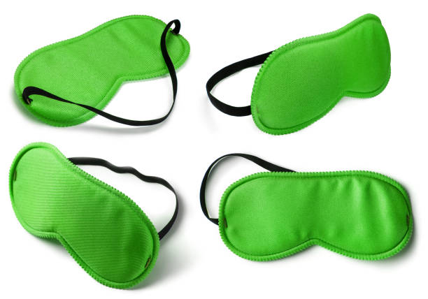 istock Collection of green sleeping masks on white 1453099999
