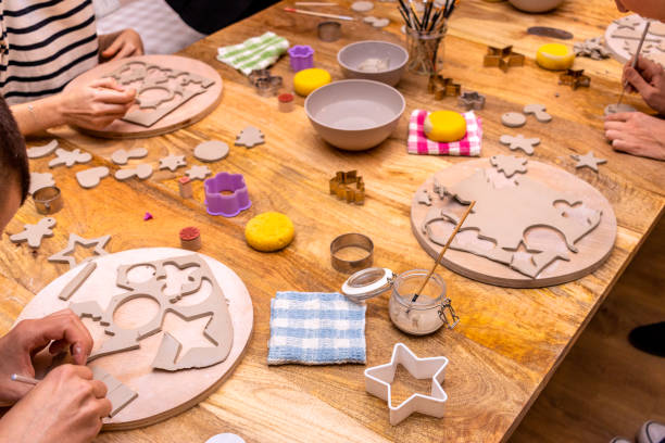 istock Women working with ceramics in a Christmas ornaments workshop. 1453102500