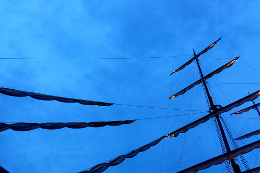 Close up large sail ship over night sky