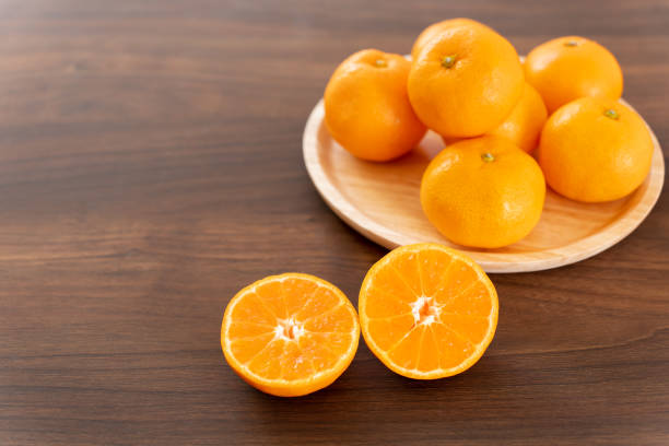 istock peeled tangerines and many tangerines 1453103869