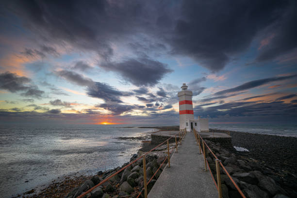 The old Gardur lighthouse at sunset, Iceland.