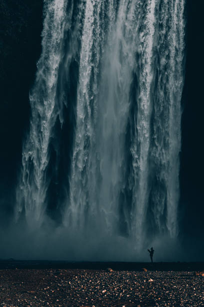 istock Tourist on the Skogafoss waterfall, Iceland. 1453105041