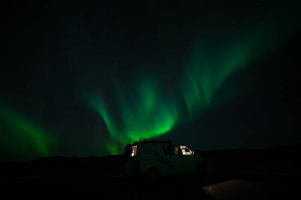 istock Northern lights, aurora borealis, over a camper van in Iceland 1453105174