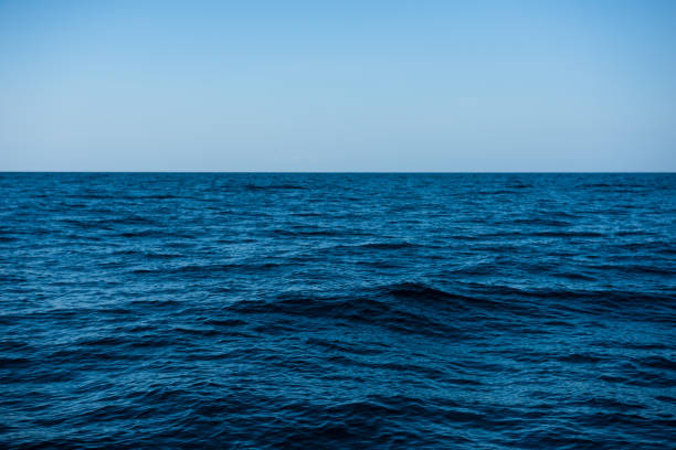 istock Blue sea on sky background 1453111725