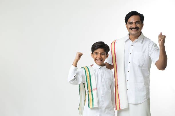 istock South Indian father and son with arms outstretched 1453115930