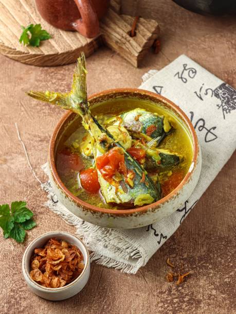 istock Yellow soup fish or sop Ikan bumbu Kuning 1453116596