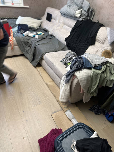 istock woman packing her bags 1453117706