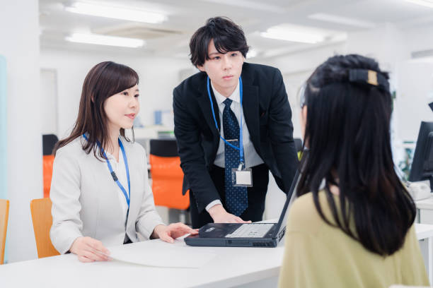 istock Business people working happily in the office 1453120039