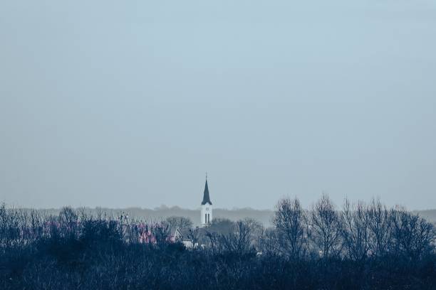 View at at the church in the distance, vegetation in lower portion of the view