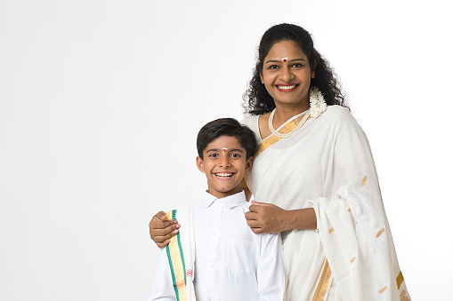 Portrait of south indian woman her son in traditional clothing