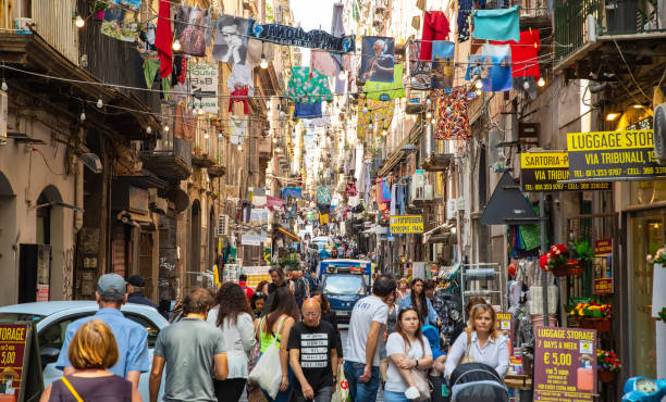 Via dei Tribunali crowded street in Naples old town, Italy stock photo