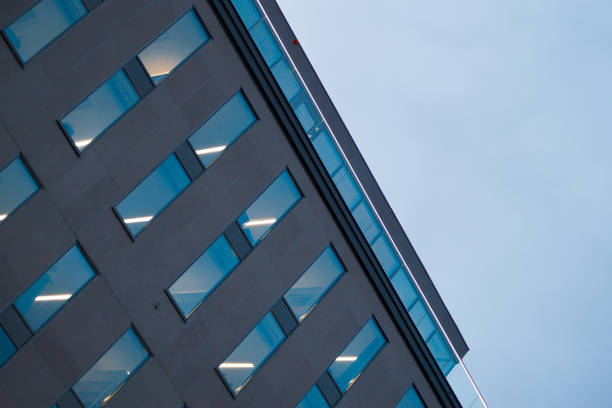 istock Low angle view of modern building against sky 1453122855