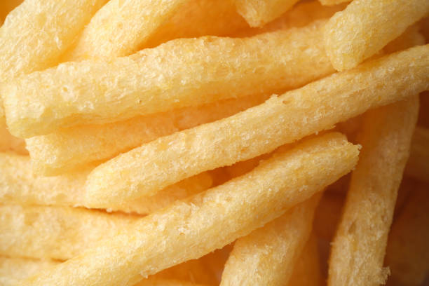 istock Overhead macro close up of potato chip fingers. 1453130452