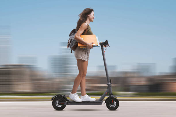 istock Student riding an electric scooter 1453133982