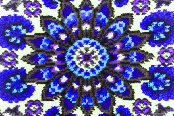 Photo of bright purple patterns on woollen woven surface. Abstract background.