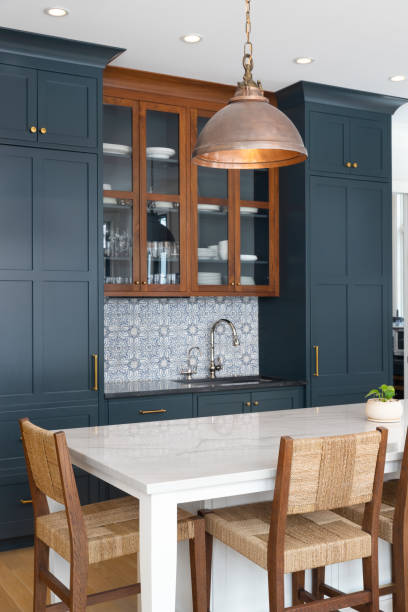 istock A kitchen detail with blue cabinets and white island. 1453138926