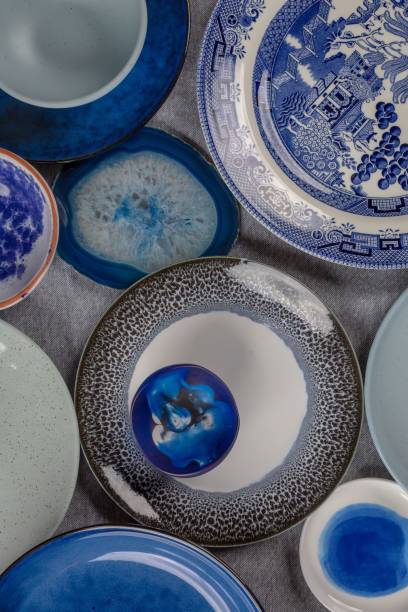 istock Vertical shot of a set of old ceramic plates with blue patterns 1453140559