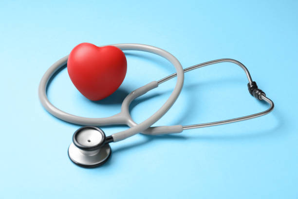 istock Stethoscope and red decorative heart on light blue background. Cardiology concept 1453140920