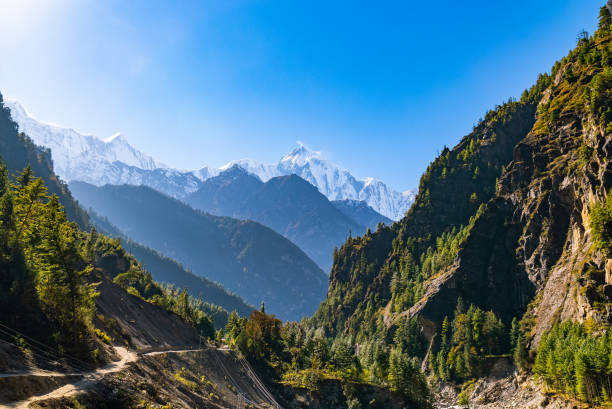istock Annapurna circuit trek path with sweeping view of the mountains and valleys on a sunny fall day 1453146784