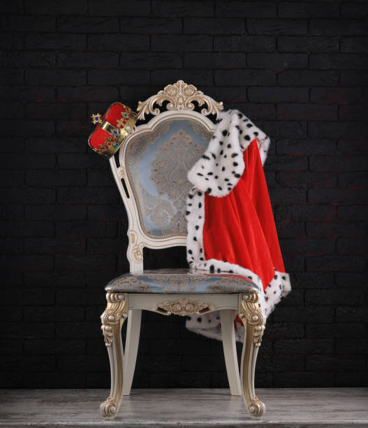 istock vintage royal chair on black background 1453153027