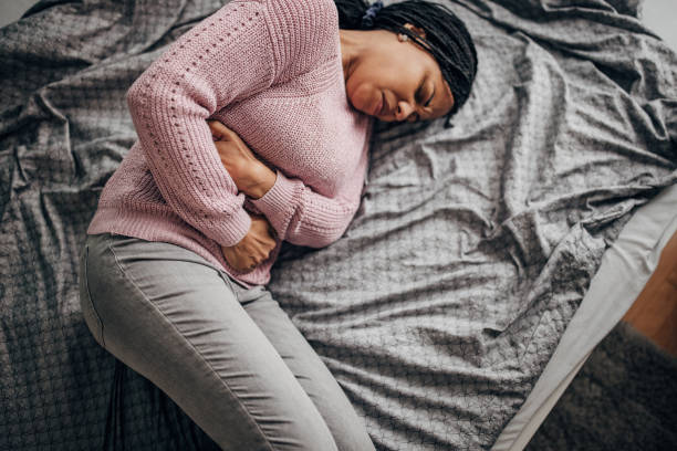 istock Woman has stomachache 1453153028